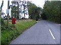 TM1953 : High Road & Forge Cottage High Road Postbox by Geographer