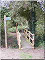 TM2158 : Footbridge of the footpaths to Yew Tree Farm & Otley Road by Geographer