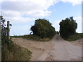 TM3847 : Footpath to Boyton Dock & entrance to Banter Barn Farm by Geographer