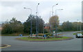 ST2995 : Six lamp posts on a mini-roundabout, Forge Hammer, Cwmbran by Jaggery