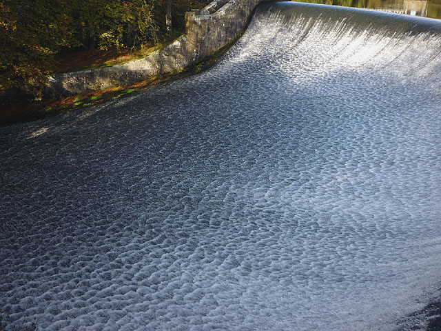 Water patterns on the weir at Abbeystead Reservoir