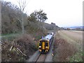 NH5546 : Railway through farmland near Kirkhill by Craig Wallace