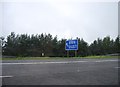 NY2869 : Sign, Junction 21, A74(M) by N Chadwick