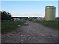 NU0134 : Storage tank and livestock pens near Wrangham by Graham Robson