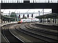 NY4055 : A Virgin Pendolino leaves Carlisle Station by Graham Robson