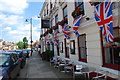 SU8821 : Union Flags hanging from The Angel Hotel by Barry Shimmon