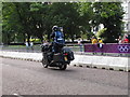 TQ2779 : Olympics triathlon Hyde Park - TV motorbike by David Hawgood