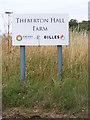 TM4366 : Theberton Hall Farm sign by Geographer