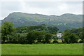 SH6039 : View Towards the Farmhouse at Hir Ynys, Gwynedd by Peter Trimming