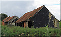 TM4099 : Old barns by Roger Jones