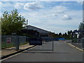 TL4295 : School gates on Cavalry Drive, March by Richard Humphrey