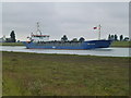 TF4926 : Boat near the lighthouses north of Sutton Bridge by Richard Humphrey