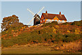 TQ2350 : Reigate Heath Windmill and Reigate Heath Golf Club clubhouse by Ian Capper