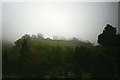 SK1582 : View towards Peveril Castle from the churchyard, Castleton by Phil Champion