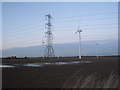 SE7113 : Pylon and windfarm by Jonathan Thacker