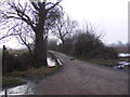 TM4468 : Footpath & entrance to Kings Farm by Geographer