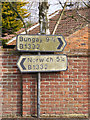 TG2701 : Roadsigns on the B1332 The Street by Geographer