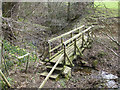 SE6797 : Wooden footbridge over beck by Pauline E