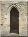 NZ1616 : A south wall entrance door by Stanley Howe