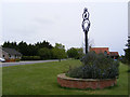 TM4087 : Church Road & Ringsfield Village sign by Geographer