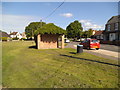 SP5704 : Green Bus Stop by Gordon Griffiths