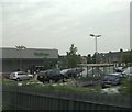 TQ1680 : Waitrose supermarket, West Ealing: fleeting glimpse from the train by Christopher Hilton