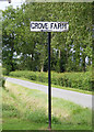 TM3686 : Grove Farm sign by Geographer