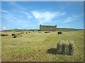 SD8689 : Roofless barn and hay bales near Hawes by Karl and Ali