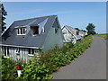 TL4786 : Unfinished bungalows at Purls Bridge, Manea by Richard Humphrey