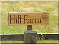 TM1959 : Hill Farm sign by Geographer