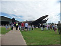 TF3362 : Lancaster bomber outside its hangar by Christine Johnstone