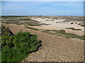 TR0817 : Looking across the shingle at Dungeness from the old railway trackbed by Marathon