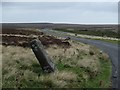 SK2582 : Stone pillar and moorland lane by Andrew Hill