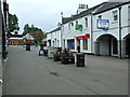 NS5574 : Main Street Milngavie by Thomas Nugent