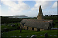 SW9377 : St Enodoc's Church and view out across the Camel Estuary by Christopher Hilton