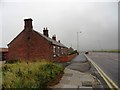 NZ3278 : Cottages at Gloucester Lodge Farm by Robert Graham