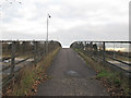 TQ5789 : Footbridge over the M25 by Roger Jones