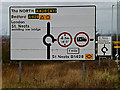 TL2159 : Roadsigns on the A428 Cambridge Road by Geographer