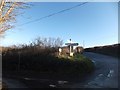 SX8255 : Signpost and crossroads at Furzehill Cross by David Smith