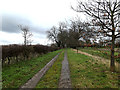 TG2504 : Entrance to St Wandregesilius Church by Geographer