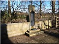 SE3422 : War memorial with wreath and poppies, Stanley by Christine Johnstone