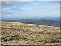 SN7722 : Rocks embedded in moorland at Tyle Du by Trevor Littlewood