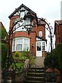 TA0287 : Wrought iron arch, Stepney Road by Christopher Hall