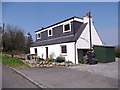 NO7094 : Cottage with front garden in Tilquhillie by Stanley Howe