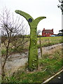 NZ9801 : Millennium signpost at Station Square by Humphrey Bolton