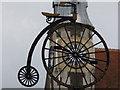 SY6990 : Dorchester: penny-farthing sign in Cornhill by Chris Downer