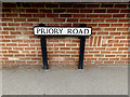 TL8642 : Priory Road sign by Geographer