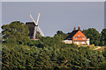 TQ2350 : Reigate Heath Windmill and Reigate Heath Golf Club clubhouse by Ian Capper