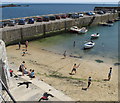 SW4626 : Beach cricket in Mousehole Harbour by David Hawgood