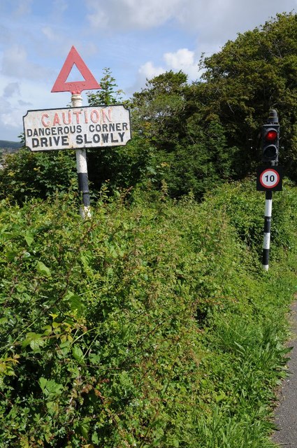 Traditional road sign and traffic lights